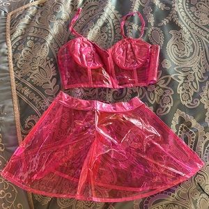 Pink clear plastic with sparkling lining.